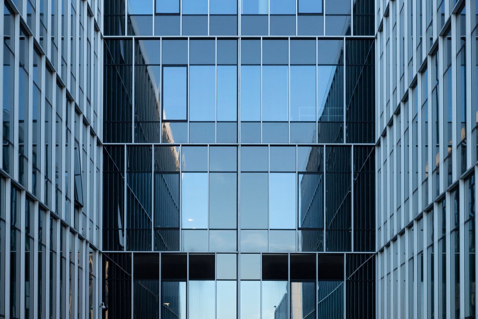 A modern glass and steel commercial office building facade