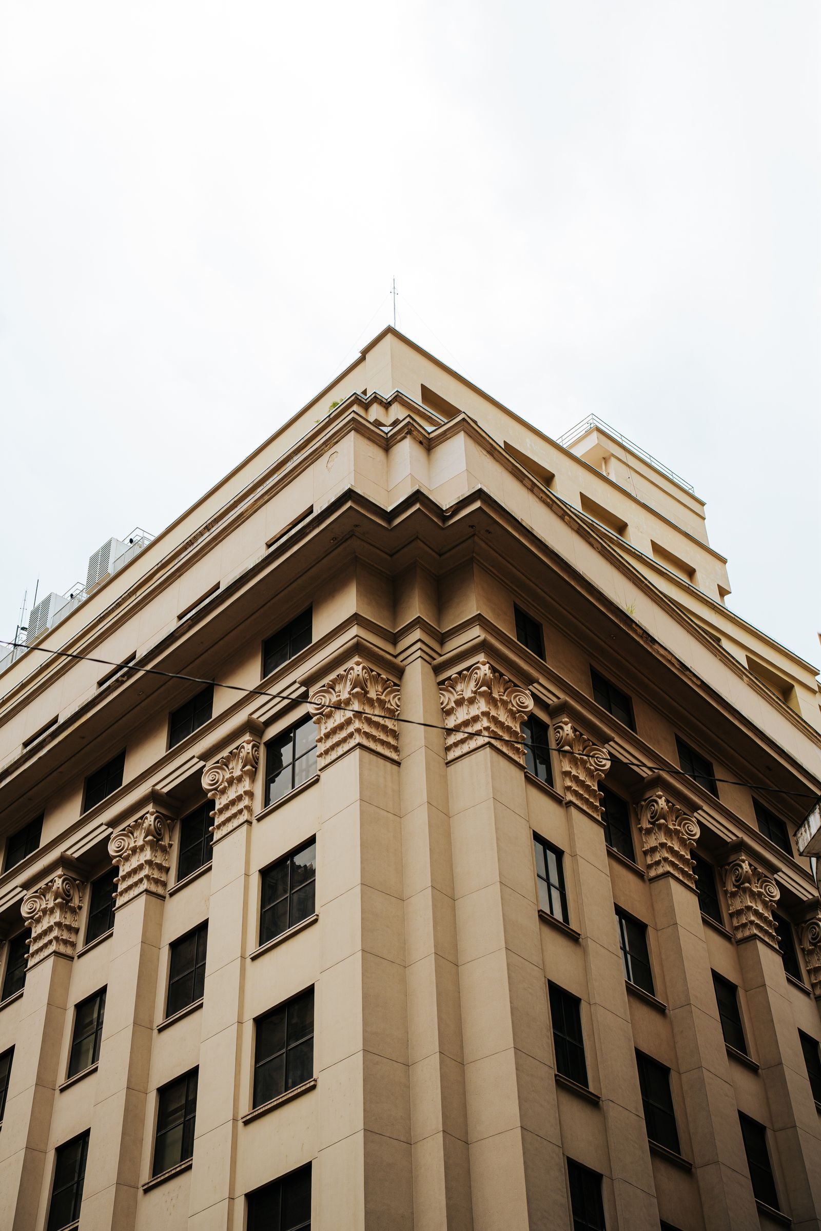 An ornate historic building facade with carved stone detailing